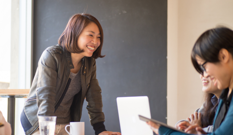 Two co-workers in an office